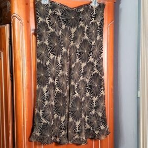 RAFELLA 100% SILK SKIRT. Geometric flower print. Size 10. Flowing look. Y2K